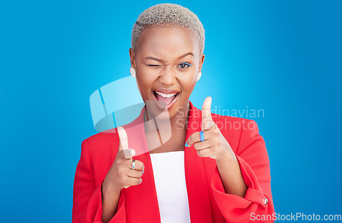 Image of Portrait, wink and finger guns with a black woman on a pink background in studio for choice or fun. Face, smile or comedy and an excited young model pointing with a hands emoji to vote as a winner