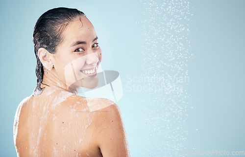 Image of Shower, mockup or happy woman cleaning back, hair or body for wellness or skincare on blue background. Smle, space or wet person washing and grooming for healthy natural hygiene or beauty to relax