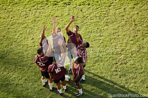 Image of Raised hand, sports and rugby people celebrate teamwork, team building or winning game, match or tournament competition. Success motivation, top view winner and circle of men happy, excited or cheers