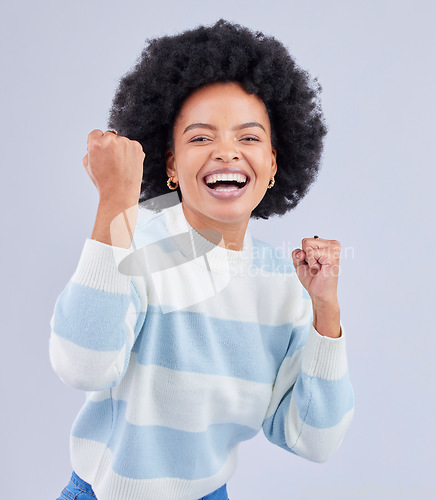 Image of Black woman, portrait and fist in studio for success, celebrate deal and winning lottery bonus on white background. Excited model, cheers and happy celebration of achievement, freedom or lotto winner