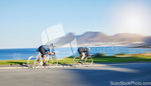 Image of Action, fitness and cyclist on bicycle on road together in mountain with helmet, exercise adventure and speed. Cycling race, nature and man with bike for fast workout, training motivation or energy.