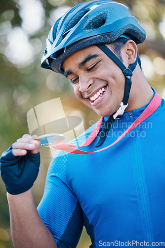 Image of Winner, medal or happy man cyclist in celebration of victory performance or success in tournament race. Excited, gold award or proud sports athlete winning a cycling competition with smile or reward
