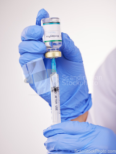 Image of Health, doctor hands and vaccine, syringe and bottle with safety from monkey pox in white background. Person with glass container, immunity and needle for healthcare, protect and medicine in studio