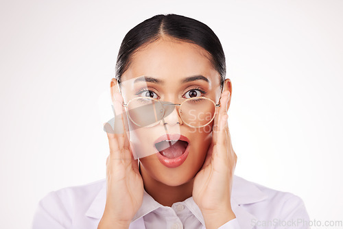 Image of Shock, glasses and portrait of businesswoman in a studio with wow, omg or wtf facial expression. Surprise, optometry and headshot of professional female model with spectacles by a white background.