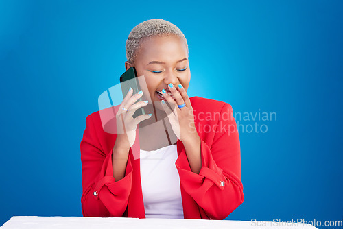 Image of Laughing, phone call and a woman in studio for communication, contact or conversation. Happy African person on a blue background with a smartphone for funny gossip chat, talking or networking
