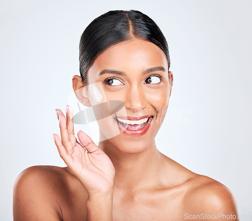 Image of Happy woman, beauty and cream on face, dermatology and skincare on white background. Lotion, sunscreen and moisturizer with wellness, skin with glow and facial mask for cosmetic care in a studio