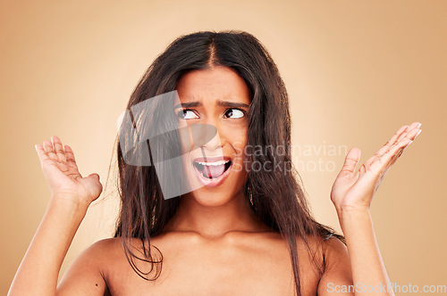 Image of Woman, hands and surprise face for announcement, scared and mouth open with shock on studio background. Natural, person and emoji or excited facial expression, mind blown and amazed at gossip