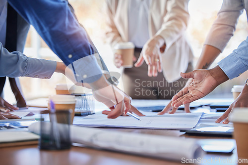 Image of Business people, hands and meeting with documents in planning, strategy or ideas together at office. Closeup of group in project plan, collaboration or teamwork on paperwork or blueprint at workplace