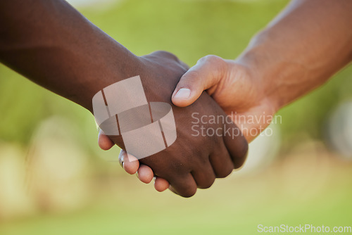 Image of People, diversity and handshake in meeting, partnership or deal for agreement in outdoor nature. Closeup of sports team shaking hands in thank you, introduction or greeting together in support