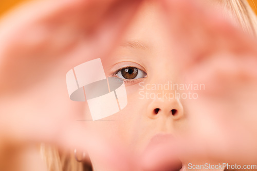 Image of Girl kid, triangle hands and studio portrait with shock, excited and sign language by yellow background. Female child, pyramid icon and face with frame, wow and closeup for diamond, symbol or emoji