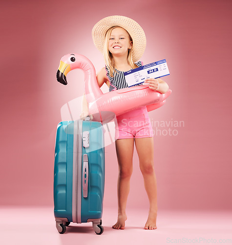 Image of Luggage, travel and girl child with passport in studio for summer vacation or holiday on pink background. Face, ticket or kid with boarding pass, flight or traveling documents for airport compliance