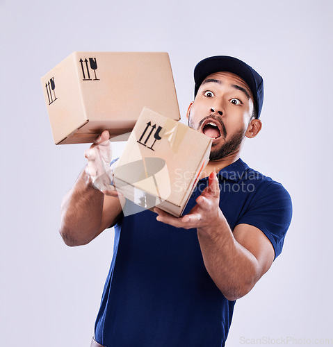 Image of Courier box, drop and delivery man mistake, problem and accident when shipping product, shopping stock or studio mail. Supply chain crisis, package cargo and export person fail on white background