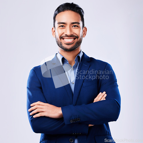 Image of Portrait, happy and business man with arms crossed in studio isolated on a white background mockup space. Professional, entrepreneur and confident worker, employee and Mexican consultant in suit.