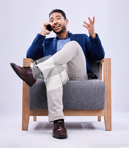 Image of Studio phone call, chair and professional man, real estate agent and business discussion, conversation and networking. Smartphone, communication and sitting realtor contact user on white background