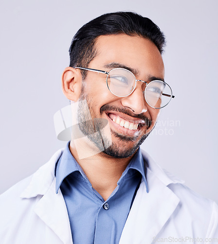 Image of Happy, smile and man doctor in a studio with glasses for vision, eye care and wellness. Pride, confidence and headshot of an Indian male healthcare professional with spectacles by white background.
