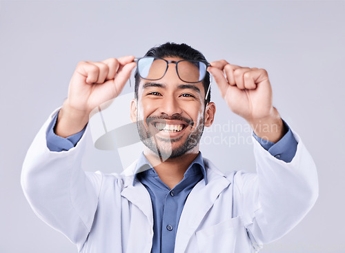 Image of Man hands, glasses and portrait of ophthalmologist at studio isolated on a white background. Frame, spectacles and happy face of optometrist, optician and doctor with vision lens, health and wellness