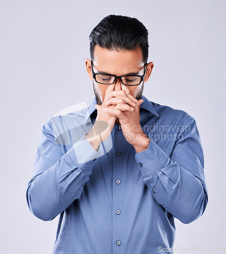 Image of Tired, stress and a man with a headache on a studio background for mental health or burnout. Anxiety, sad or an Asian businessman with migraine pain from depression, mistake or frustrated with a fail