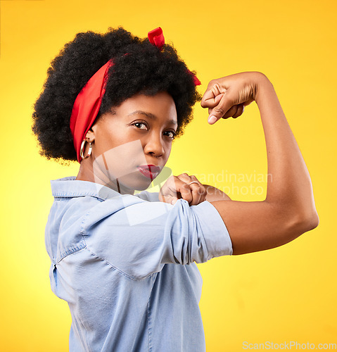 Image of Power, flex and success with portrait of black woman in studio for muscle, motivation and energy. Empowerment, pride and champion with person and fist on yellow background for challenge and hard work