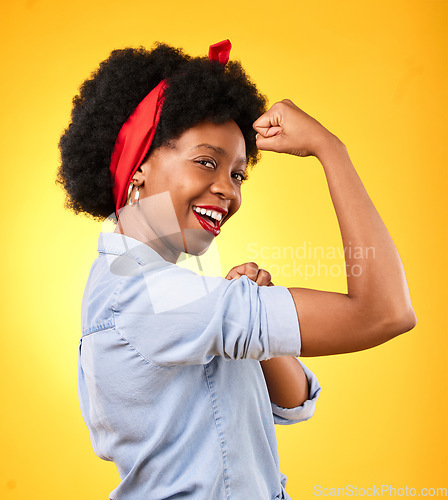 Image of Muscle, flex and smile with portrait of black woman in studio for power, motivation and energy. Empowerment, pride and champion with person and fist on yellow background for challenge and hard work