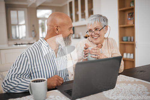 Image of Laptop, coffee and senior couple in conversation browsing on social media, website or internet. Technology, bond and elderly man and woman in retirement with cappuccino talking with computer at home.