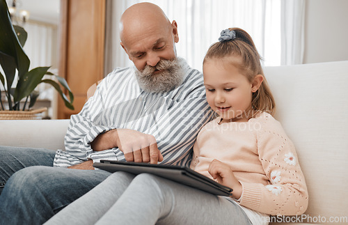 Image of Grandfather, tablet or child elearning for education, skills development or knowledge in online class. Tech, grandfather or young girl student learning course on website or social media at home