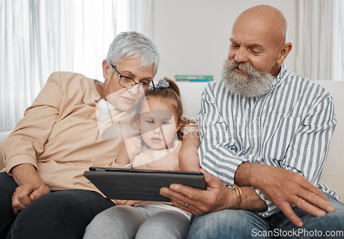 Image of Relax, kid or grandparents with tablet for elearning or studying for education or remote learning at home. Family, grandfather or grandmother with girl reading ebook or streaming videos or movies