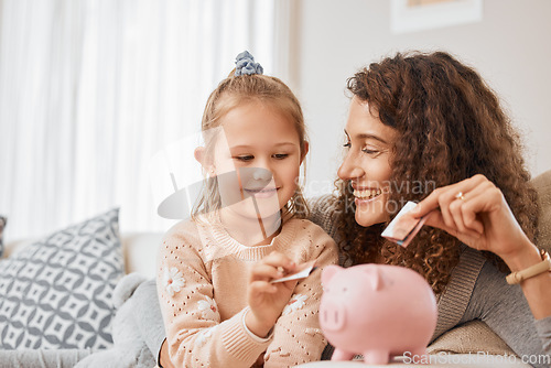 Image of Mother, child learning or piggy bank with savings, profit or money for education in home living room. Euros, smile or happy mom teaching kid with cash box, financial investment or budget growth