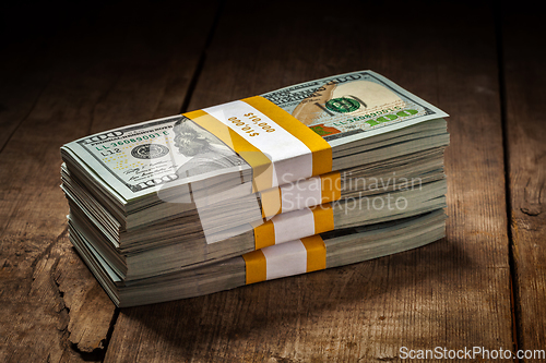 Image of Stacks of new 100 US dollars 2013 banknotes