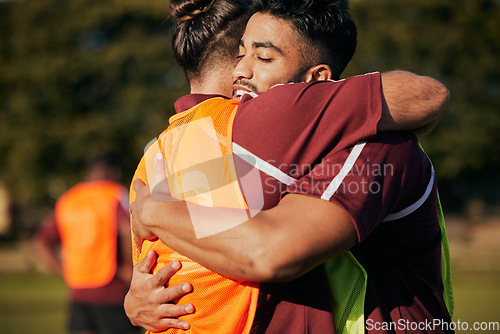 Image of Hug, soccer and men with fitness, support and celebration with teamwork, cooperation and training. People, healthy players or friends on a field, sports or embrace with exercise, winning or gratitude