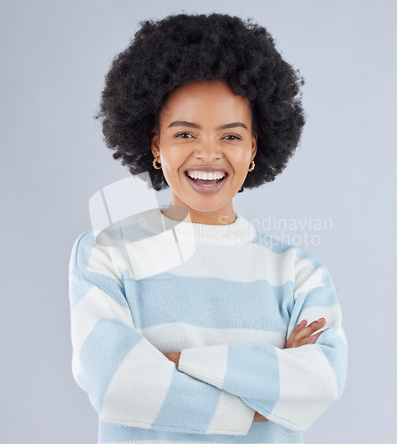 Image of Fashion, arms crossed and smile with portrait of black woman in studio for education, casual and trendy style. Happy, pride and confidence with person on white background for college, future or gen z