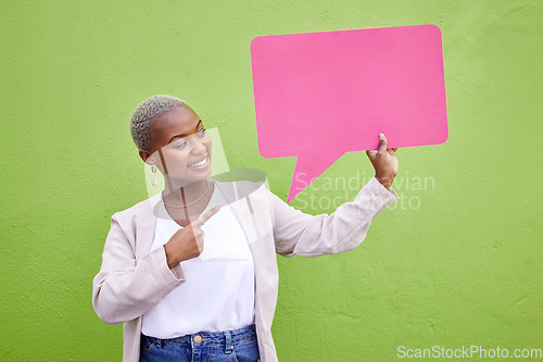 Image of Black woman, speech bubble and thinking for pointing, space or mockup with opinion by green wall background. African girl, billboard and paper poster for voice, vote and social network for feedback