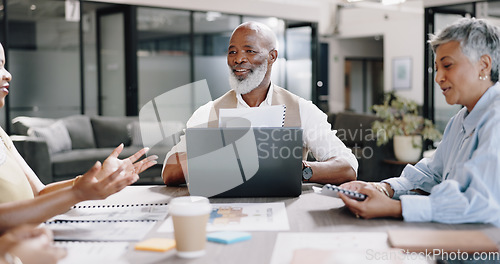 Image of Laptop, CEO and meeting with a business team in the boardroom for planning a group strategy. Teamwork, collaboration or mature black man or women with employees working, talking or speaking of ideas