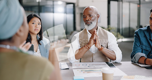 Image of Senior black man, boss or meeting with business people in collaboration for project planning in office. Team discussion, employees or African CEO with paperwork listening to ideas or feedback review