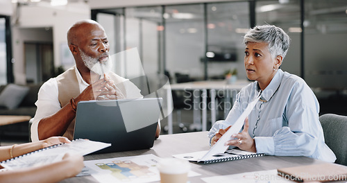 Image of Laptop, documents and meeting with a business team in the boardroom for planning or strategy. Teamwork, collaboration and management with a man and woman employee group working on the company vision