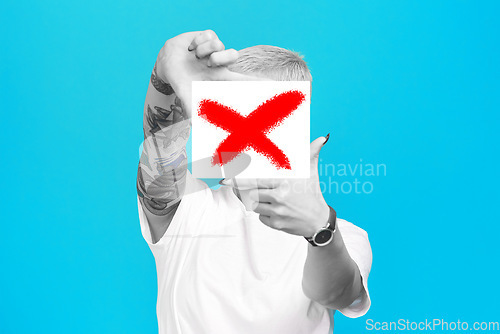 Image of Stop, finger frame or woman in studio to block censored profile picture on box or blue background. Hands, cancel culture sign or person with perspective of photography, selfie or creative inspiration