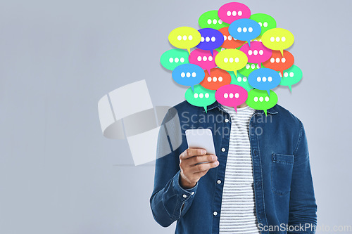 Image of Social media, man and speech bubble with phone in studio, gray background and overlay with graphic, icon or speech bubble. Online, chat and communication of info with internet, connection and voice