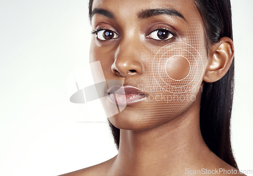 Image of Portrait, target and facial recognition for skincare with a woman in studio isolated on white background. Beauty, hologram and digital with a model scanning her face for makeup innovation or change