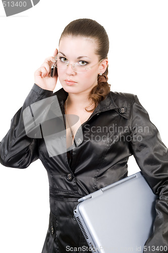 Image of Businesswoman with laptop and phone over white