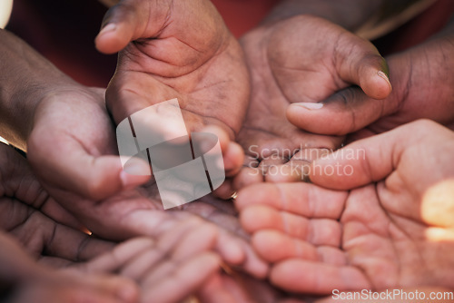 Image of Hands, palm and diversity of people in circle for charity, ngo and support in poor community together from above. Helping hand, donation and empathy for children in poverty, society and crowdfunding