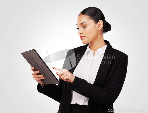 Image of Studio, woman and lawyer working with tablet for online news, research and work information on website or white background. Reading, mobile app and typing law notes, report or email feedback