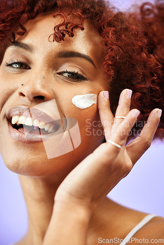 Image of Beauty, studio portrait or happy woman with cream product, melasma treatment results or collagen skincare. Facial hydration, face routine or girl smile for dermatology acne creme on purple background