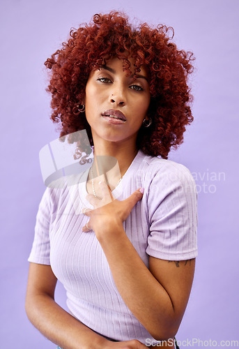 Image of Serious, portrait and African woman with fashion, natural beauty and gen z confidence on purple background in studio. Dermatology, face and model with pride, style and pose for cosmetics or skincare