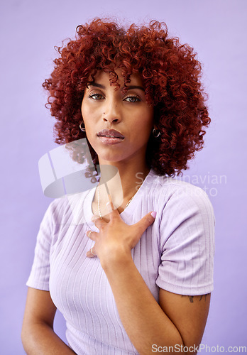 Image of Serious, portrait and African woman with fashion, natural beauty and gen z confidence on purple background in studio. Dermatology, face and model with pride, style and pose for cosmetics or skincare