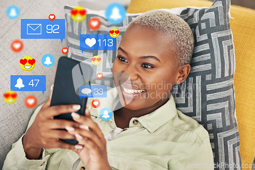 Image of Black woman on sofa with phone, and emoji on social media, chat or video online in home. Happy face, smile and internet, girl on couch with connectivity on smartphone and funny viral meme or post.