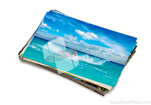 Image of Stack of vacation photos isolated