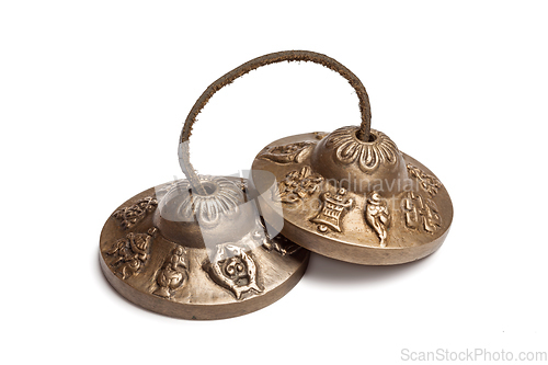 Image of Tibetan Buddhist tingsha cymbals isolated