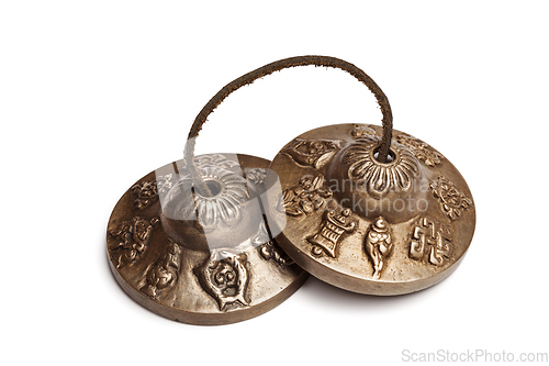 Image of Tibetan Buddhist tingsha cymbals isolated
