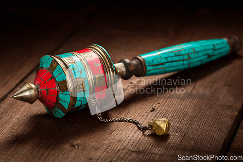 Image of Tibetan buddhist Mani wheel or hand prayer wheel