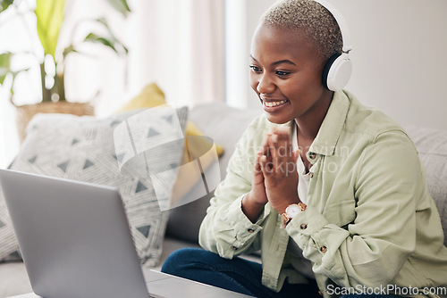 Image of Laptop, home and happy woman reading results, email or feedback for job opportunity success. Gratitude, headphones or excited African person in celebration of review or online sales on computer or pc