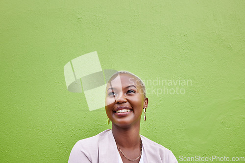 Image of Happy, thinking and black woman by green wall with mockup space for marketing, promotion or advertising. Idea, smile and young African female model with dreaming, memory or reflection face expression